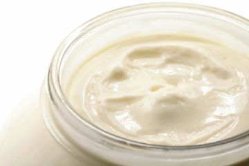 Mayonnaise coated egg halves